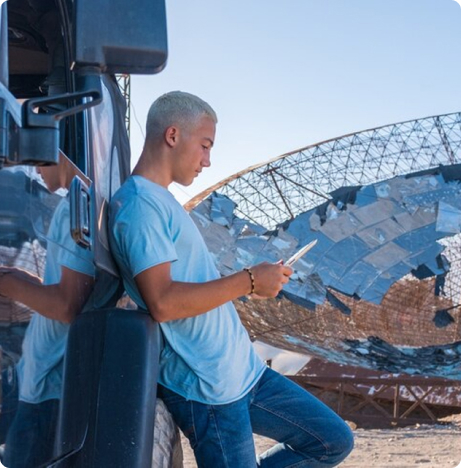 An engineer inspecting solar panels